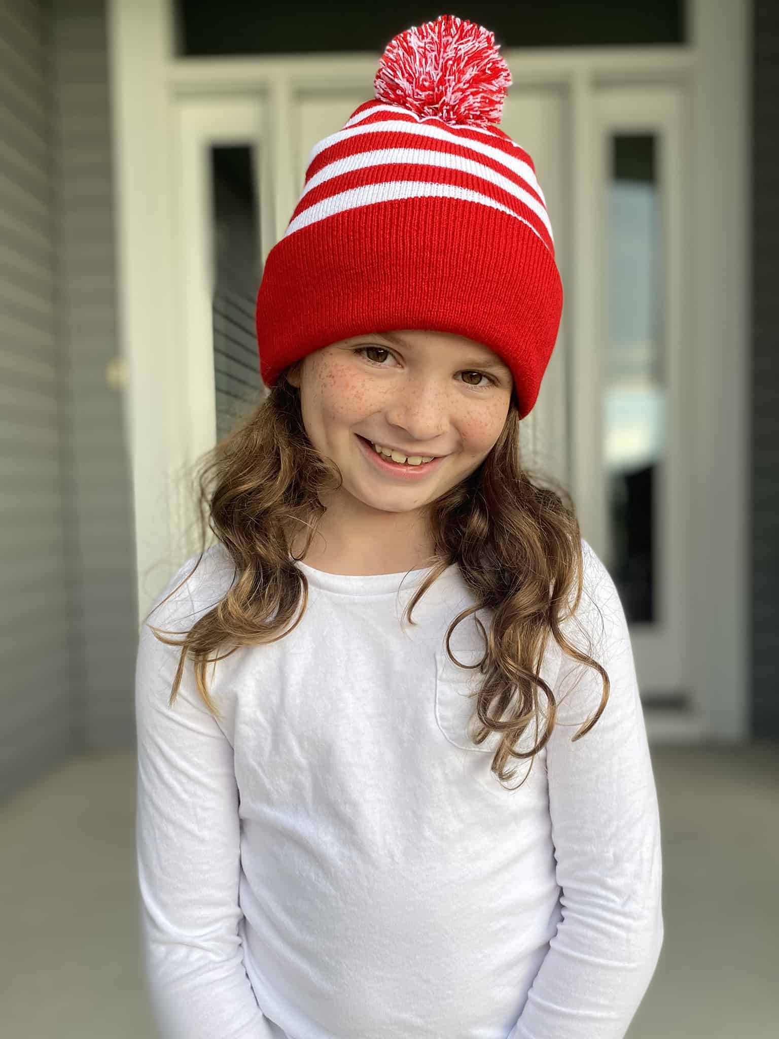 A beautiful smile wearing a striped cap #forRMHC