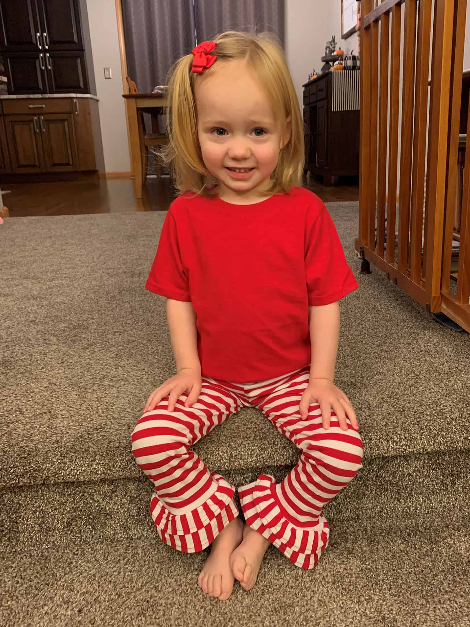 Hannah showing her striped ruffle-pants #forRMHC