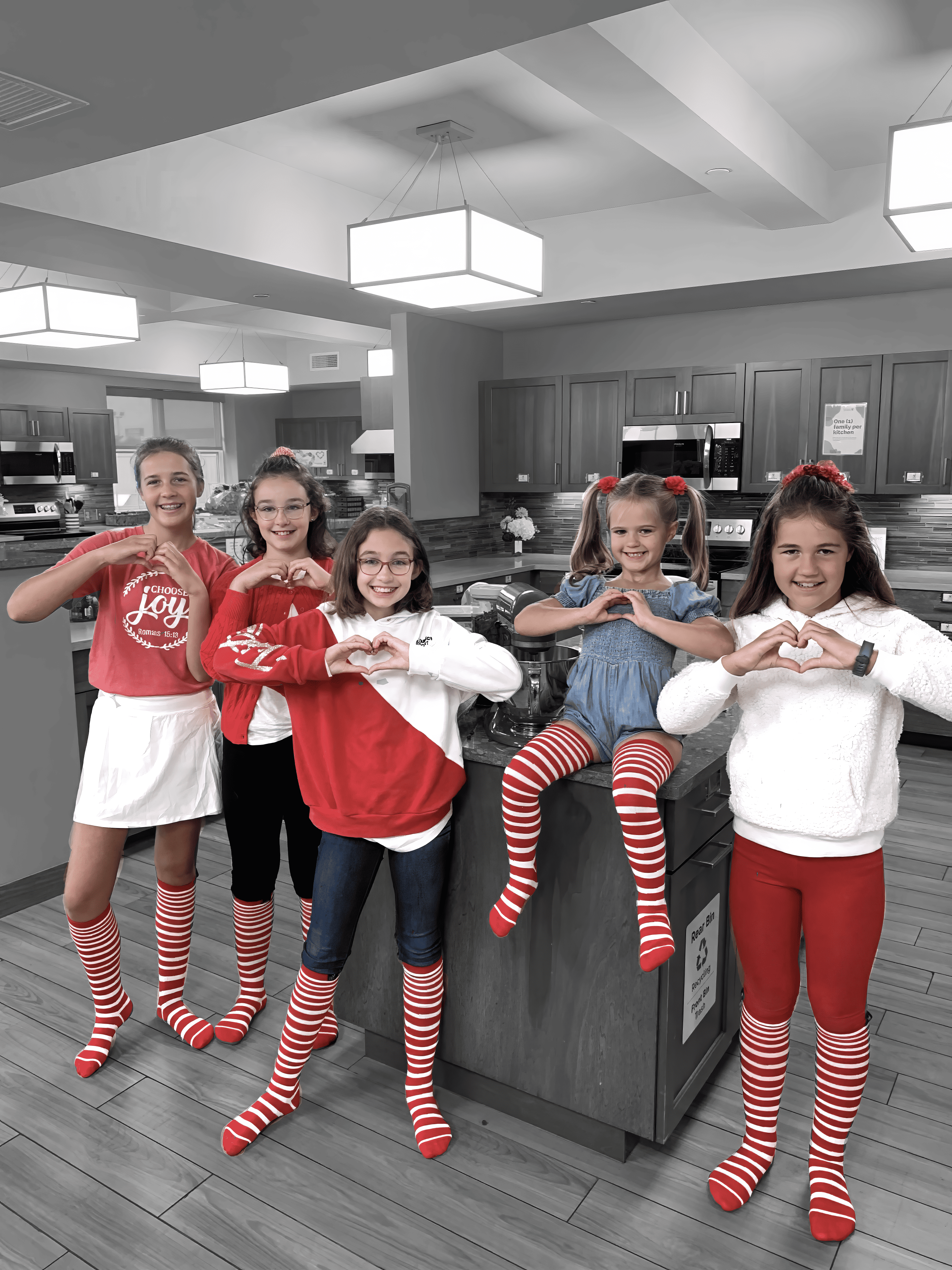 Kids with striped socks in kitchen